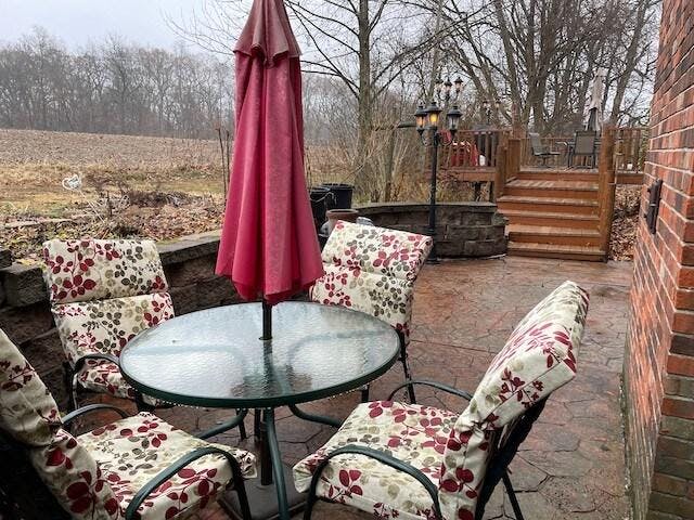 Patio seating and additional seating on the deck