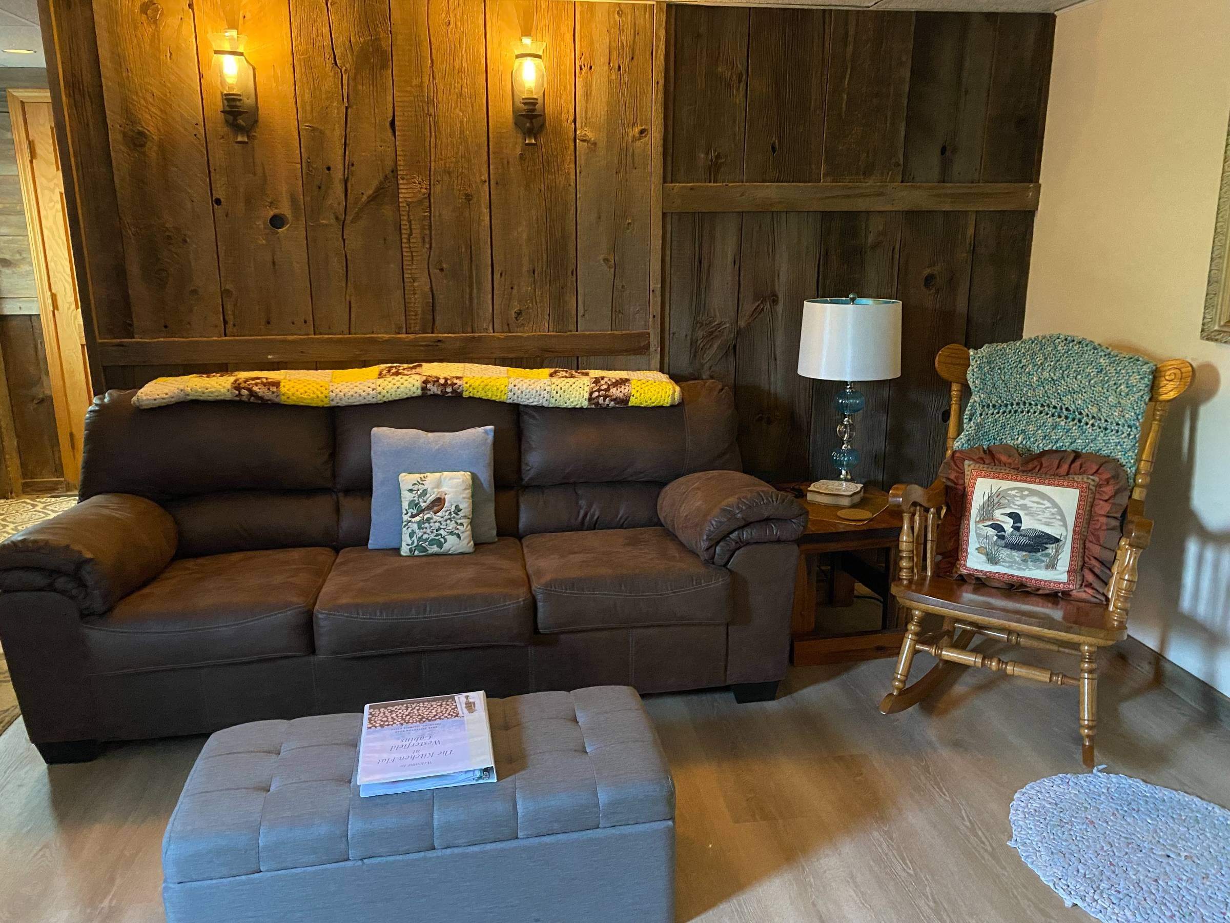 This sofa sleeper is new and lets 4 people stay in the Kitchen Flat Apartment.  Bedding is in the chifforobe.