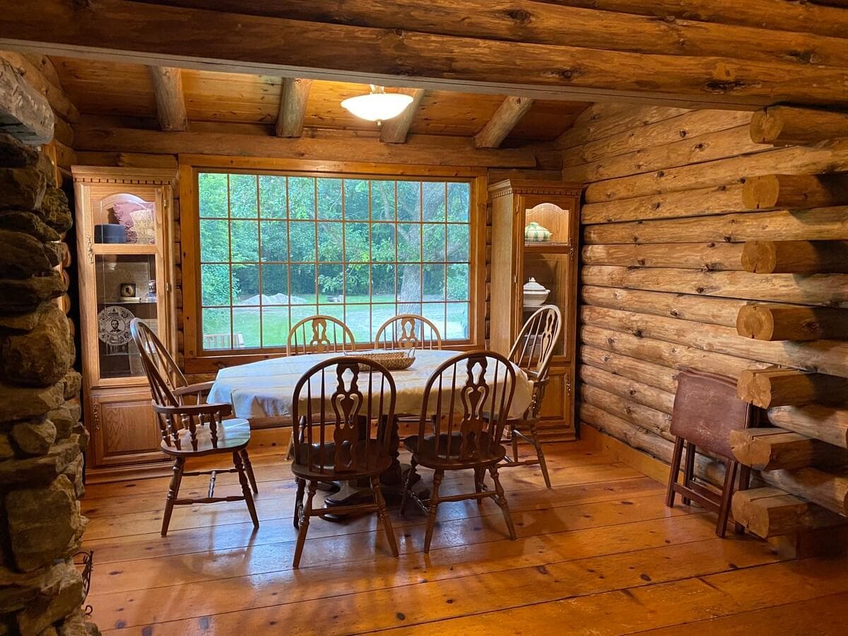 Dining area next to grand sitting room - open floor plan to the kitchenette